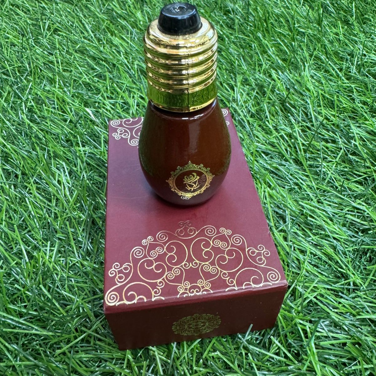 Bulb-Shaped Antique and Fancy Bottle in Red